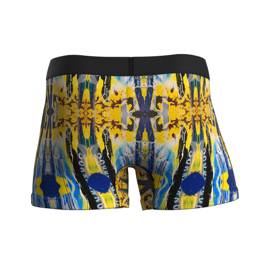 Manley Hello! Yellow boxer briefs, designed by artist Anthony Ricciardi, abstract design in blue, yellow, black, and white. Manley Barrier Technology that stops the pee spot. Feel manly in Manley.Stop the Pee Spot.