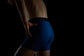 Eclectic Blue boxer briefs with Manley Barrier Technology that stops the pee spot. Feel manly in Manley. Model wearing Eclectic Blue boxer briefs, side/back view