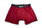 Red Manley boxer briefs lying flat. Shows the Manley logo on the waistband. 